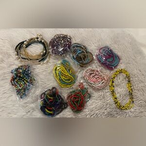 10 waist bands including some ankle bracelets